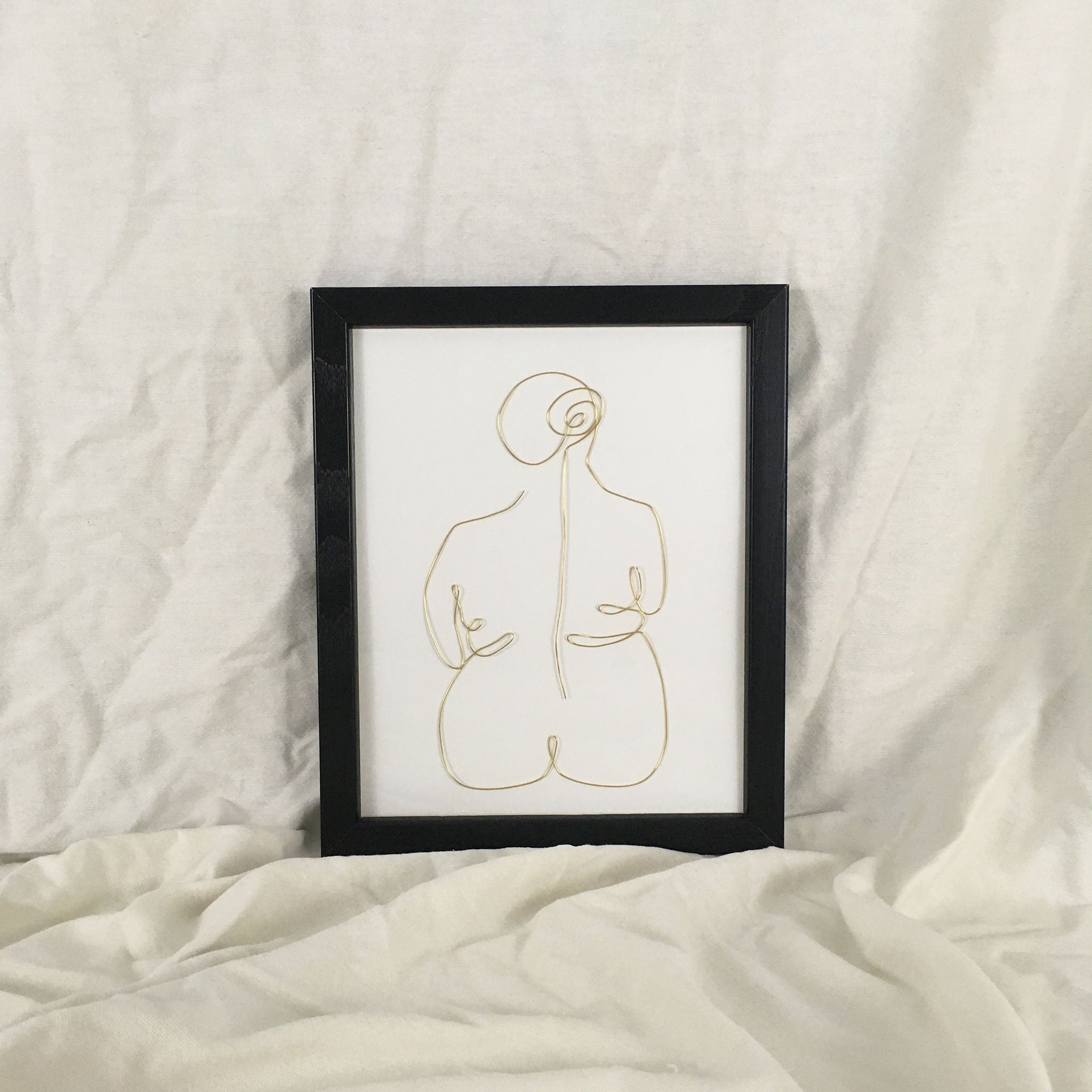 Lounge wire art - black frame gold wire