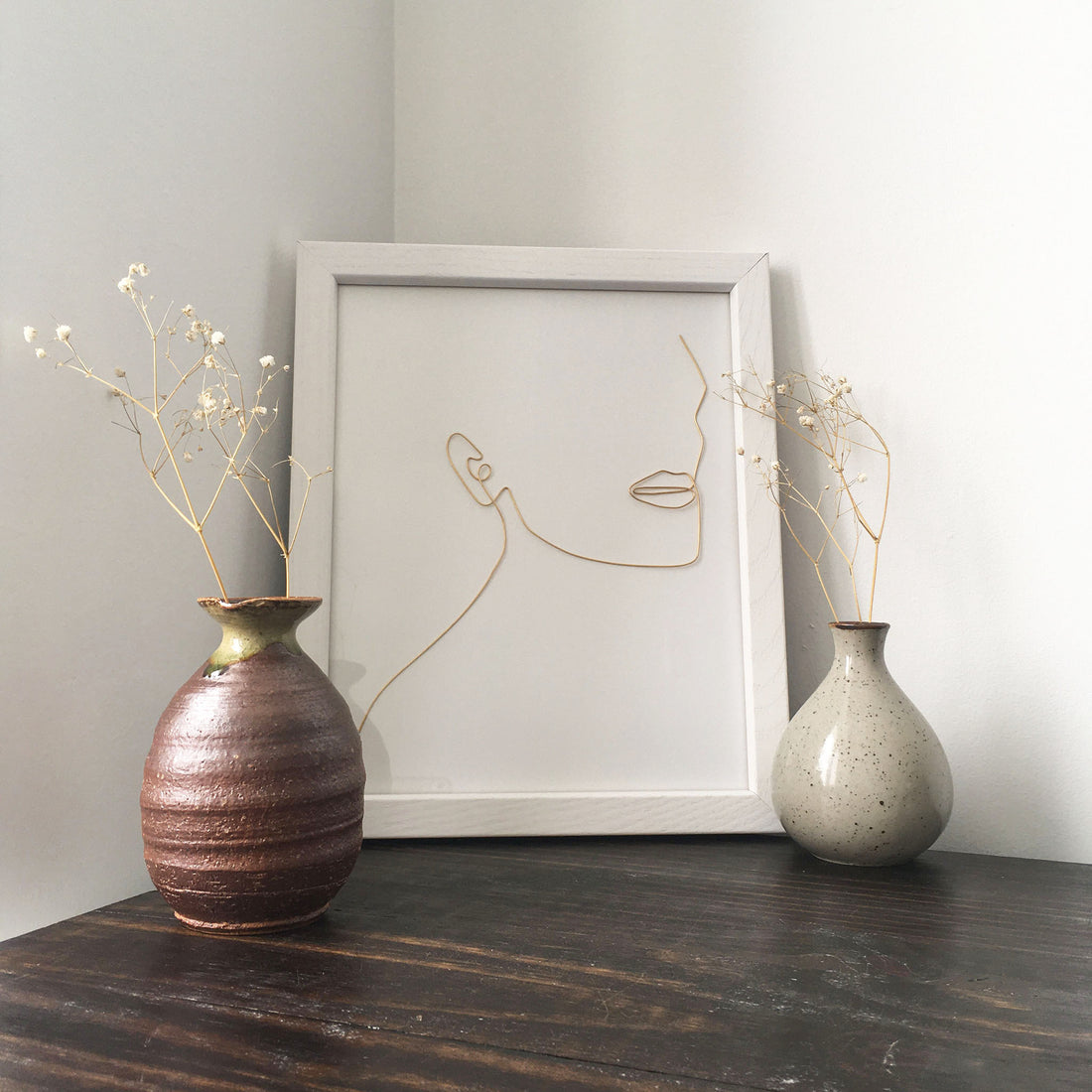 Unwind Wire Art - white frame lifestyle